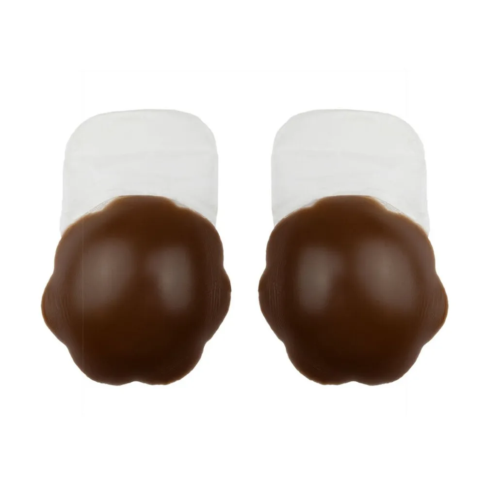 Paire de pétales adhésifs en silicone beige clair avec zone de fixation blanche, vue de face