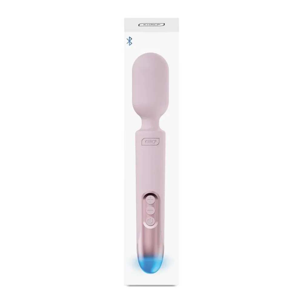 Wand rose poudré avec tête arrondie, corps cylindrique et embout noir, présenté sur fond blanc