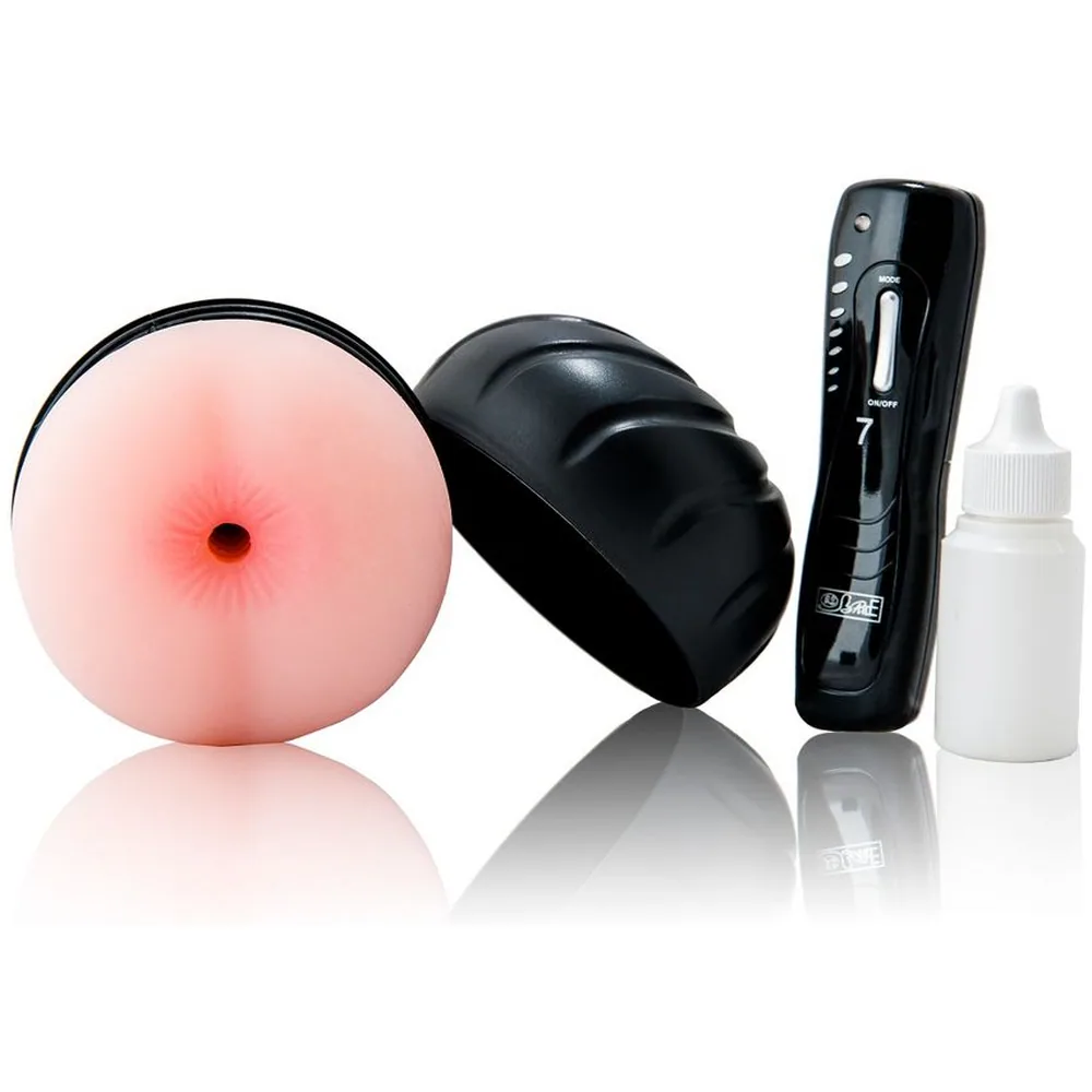 Masturbateur rose et noir avec emballage illustré, télécommande filaire noire, balle vibrante rose et flacon de lubrifiant blanc sur fond gris