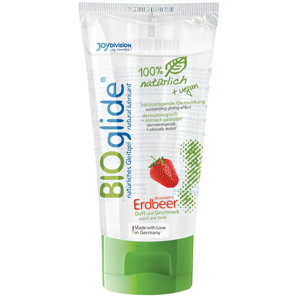 Tube de lubrifiant Bioglide à base de fraise, blanc et vert, affichant 100% naturel et vegan, sur fond blanc