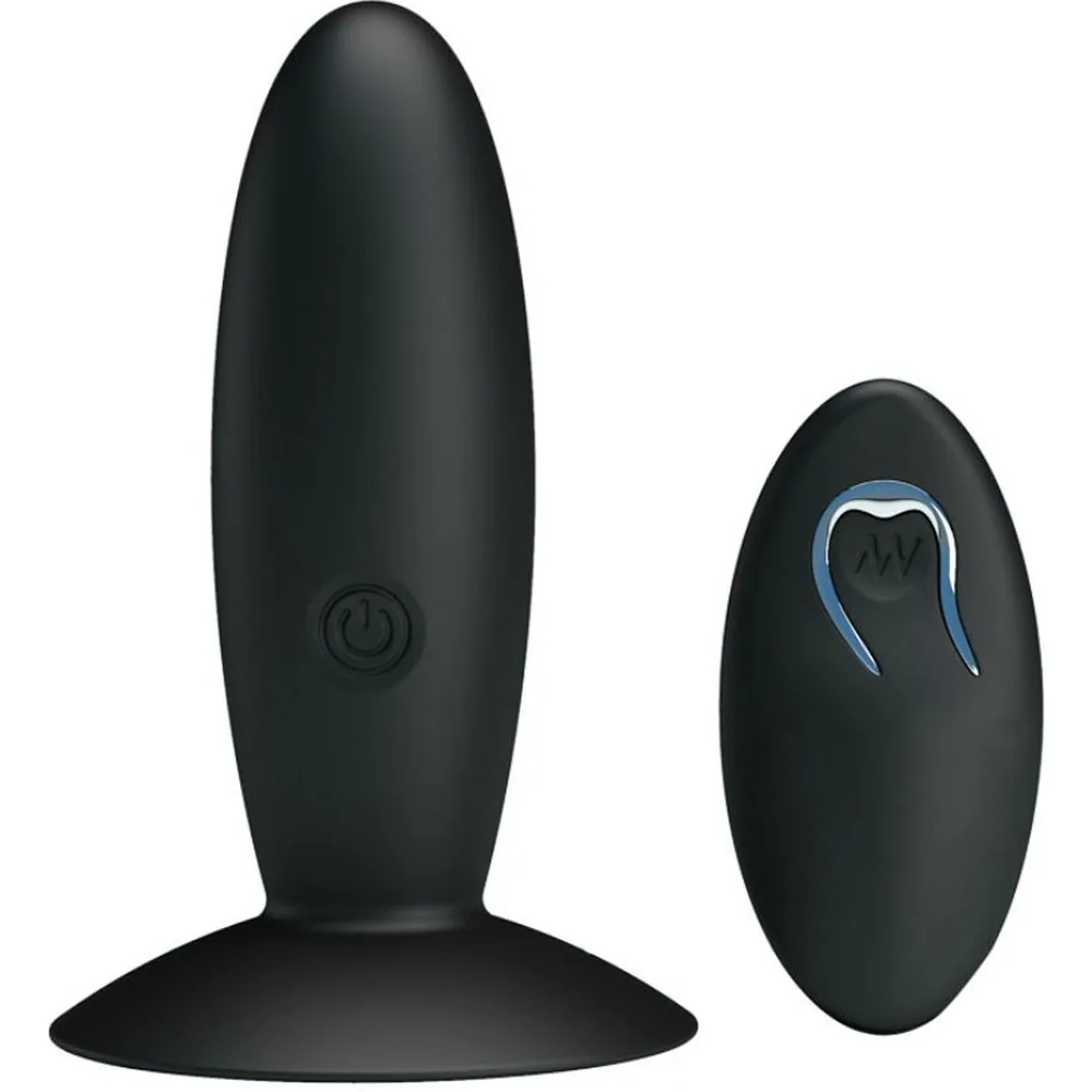 Schéma de dimensions d'un plug anal noir en silicone avec ventouse, montrant 110 mm de hauteur et 33 mm de largeur, accompagné de sa télécommande noire de 75 mm de hauteur