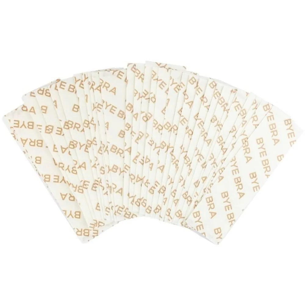 Bra autocollant transparent à motif dalmatien blanc et noir, porté sur une poitrine avec démonstration du positionnement par pointillés jaunes, accompagné d'un sachet de vingt adhésifs transparents