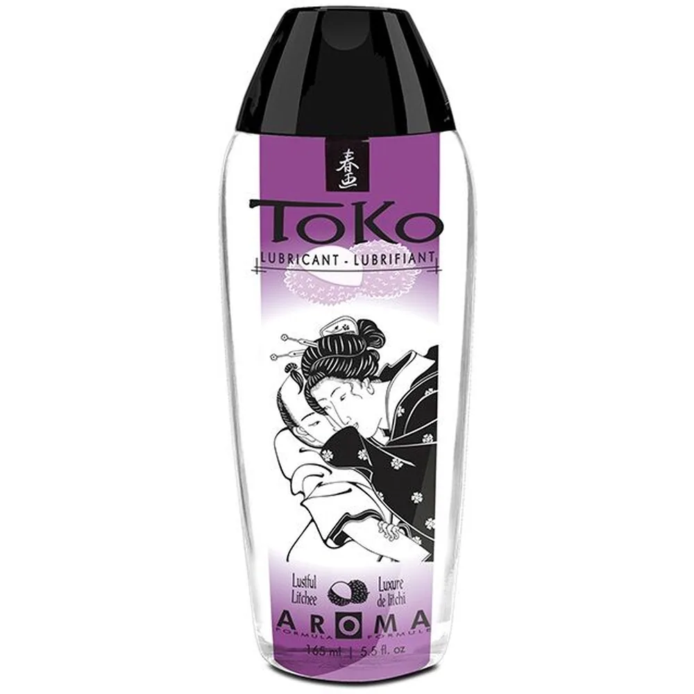 Flacon de lubrifiant Toko Aroma au litchi, bouteille transparente avec étiquette violette et noire, capuchon noir, 165 ml