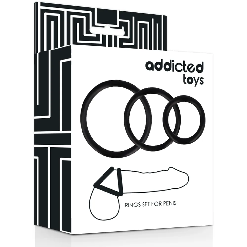 Emballage blanc et noir de la marque Addicted Toys avec trois cockrings noirs en silicone de diamètres différents disposés à côté