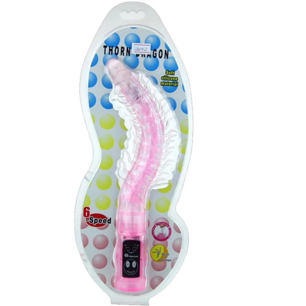 Vibromasseur rose transparent avec tige flexible garnie de picots, embout arrondi, boîtier de commande noir à la base sur fond blanc