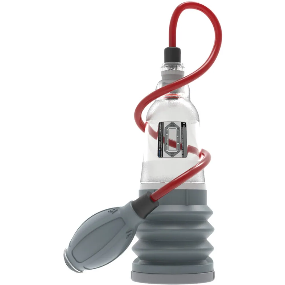 Pompe à pénis Bathmate HydroXtreme avec cylindre transparent à tube rouge, accompagnée de son emballage noir, d'une housse de rangement, d'accessoires et d'une bande de mesure