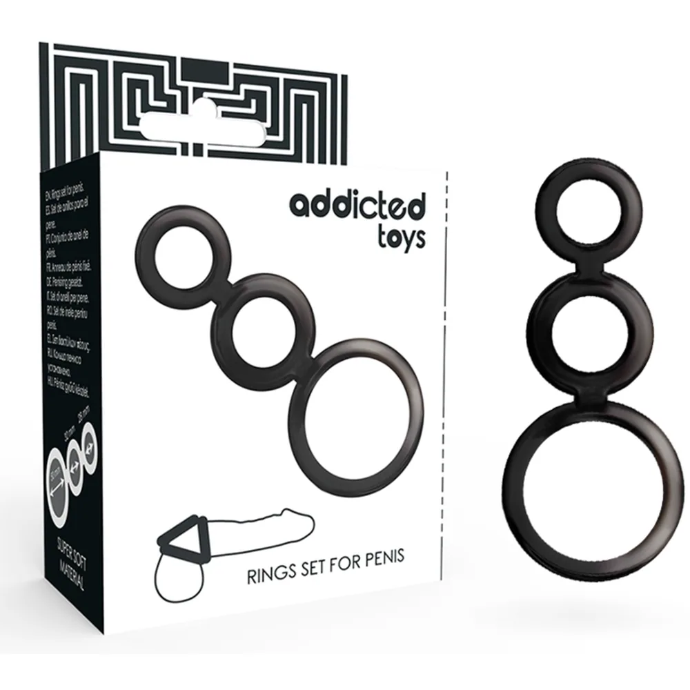 Boîte noire Addicted Toys avec trois anneaux de péniens en silicone fumé de tailles progressives, affichés à côté de leur emballage