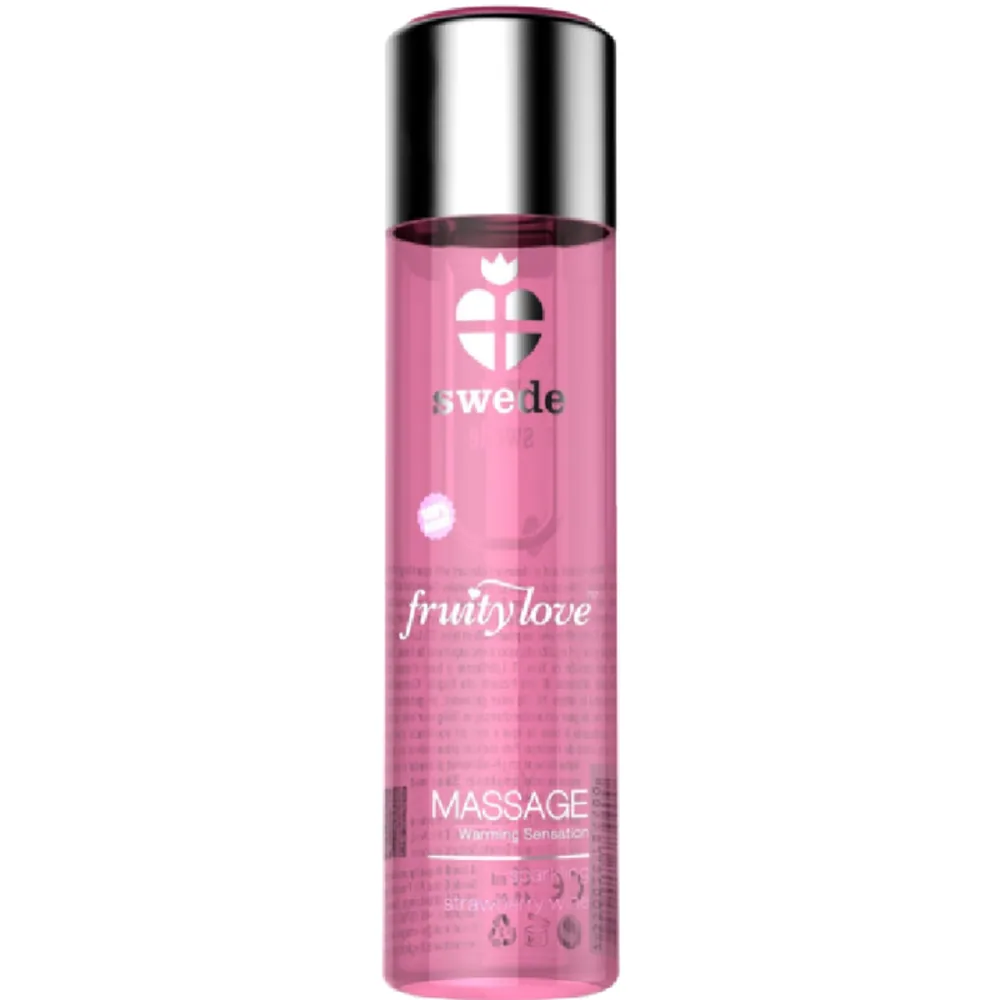 Flacon transparent rose contenant une huile de massage, bouchon argenté, étiquette blanche Swede Fruity Love avec inscriptions de marque et mention Massage Warming Sensation