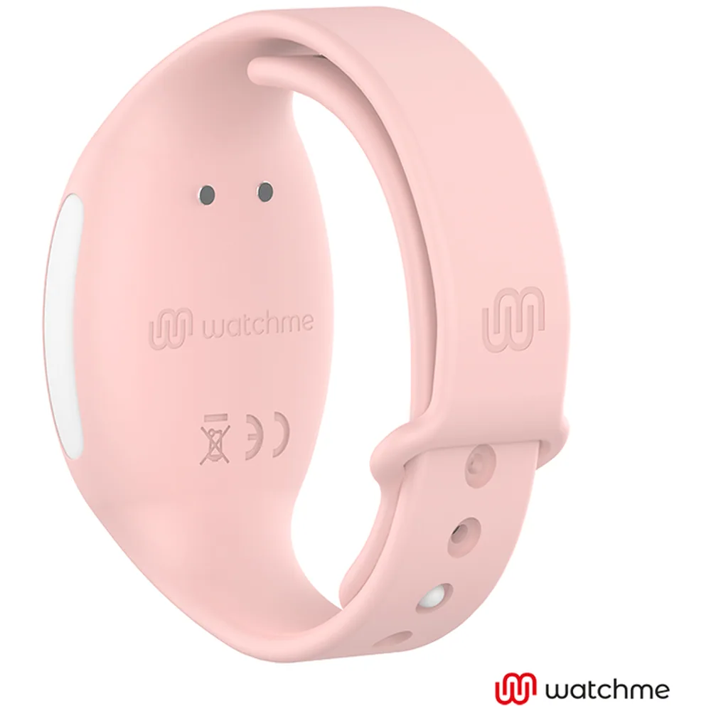Coffret Watchme contenant un œuf vibrant turquoise à télécommande rose, une montre-bracelet rose avec boutons de contrôle, un câble USB et sa boîte de présentation sur fond blanc