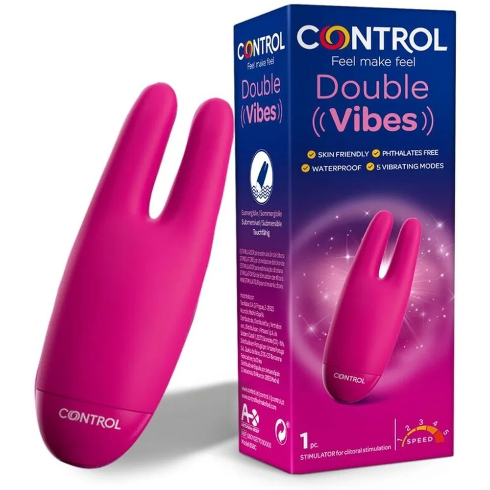 Emballage du stimulateur clitoridien Double Vibes Control rose fuchsia, avec deux branches vibrantes visibles et mentions de 5 modes de vibration et imperméabilité