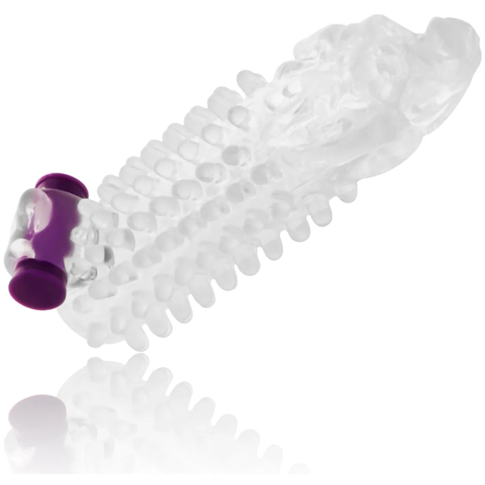 Gaine transparente avec picots denses couvrant toute la surface, base violette avec contrôle vibrant intégré, sur fond blanc