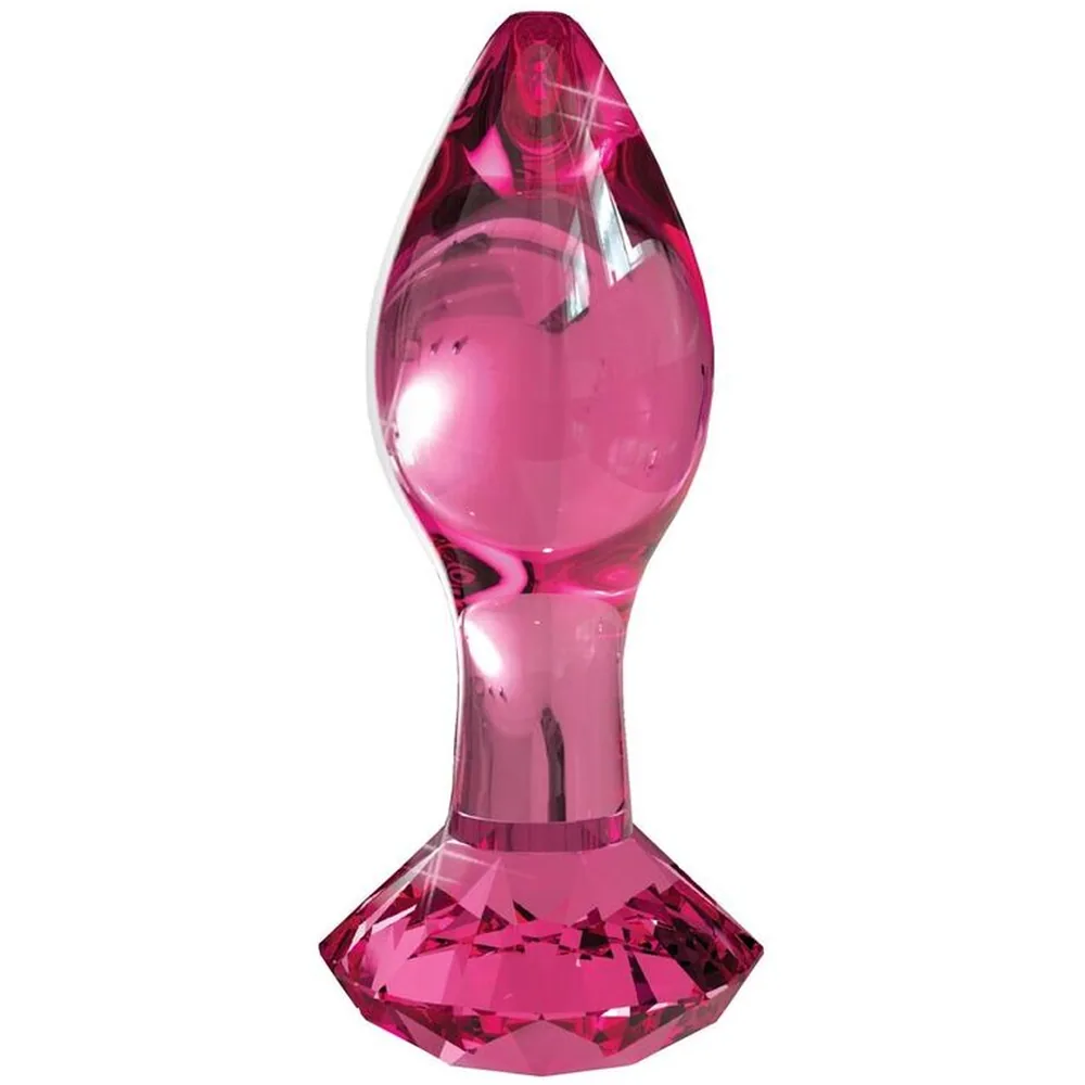 Plug anal en verre rose foncé translucide, forme bulbeuse avec base facettée, capuchon pointu et col resserré, reflets brillants sur fond blanc