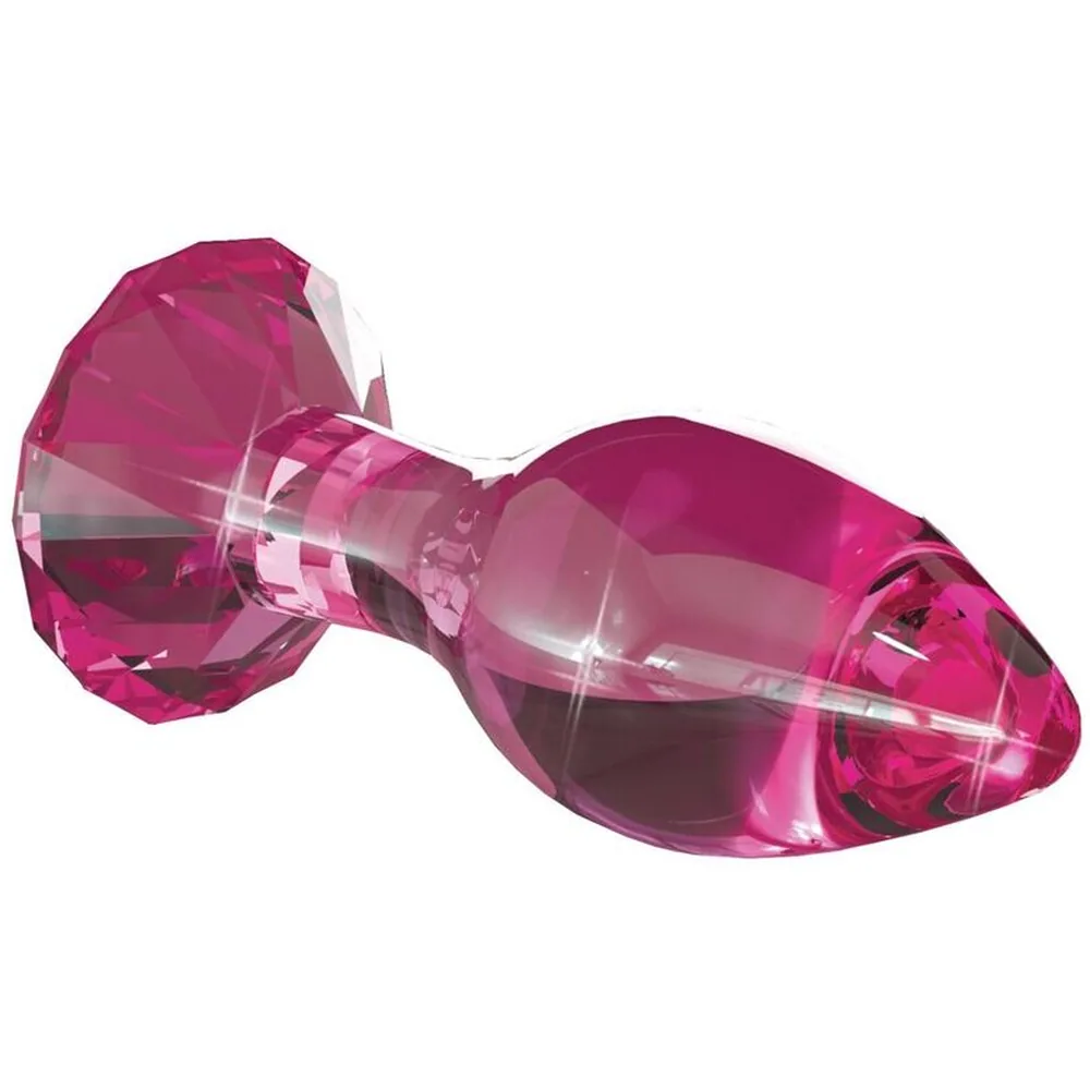 Plug anal en verre rose foncé translucide, forme bulbeuse avec base facettée, capuchon pointu et col resserré, reflets brillants sur fond blanc