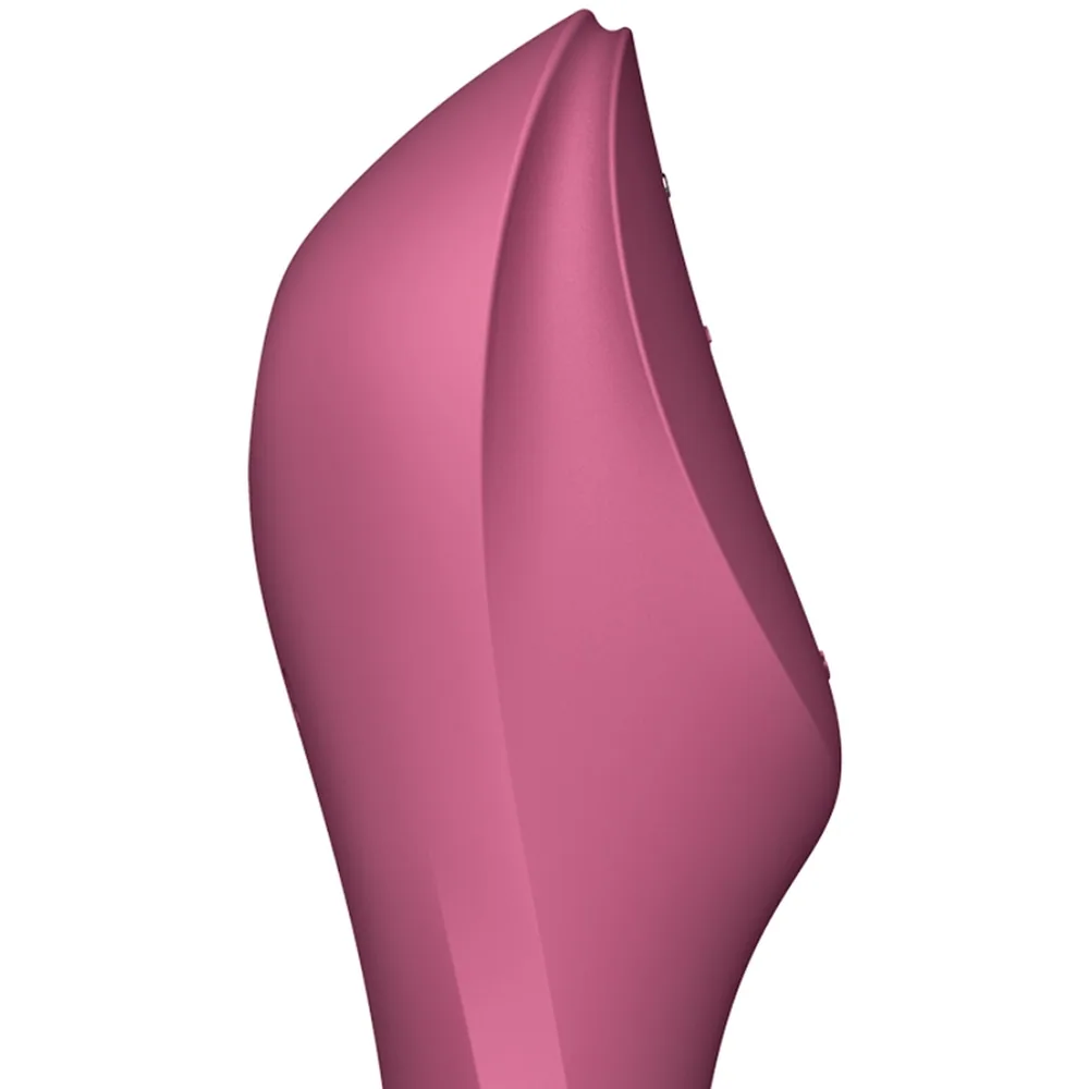 Stimulateur en silicone rose mauve, forme ergonomique incurvée avec embout arrrondi et orifice d'air pulsé à l'extrémité, sur fond blanc
