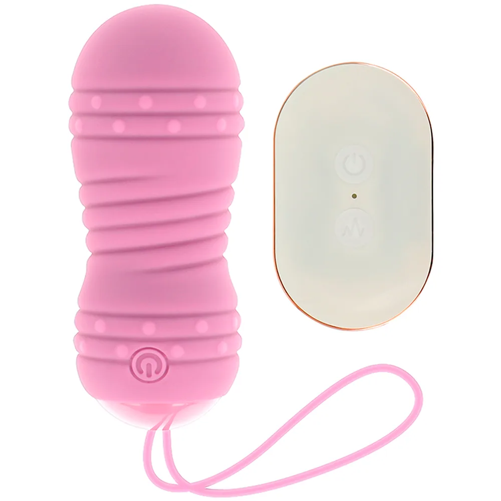 Œuf rose pâle à rainures avec perles internes, connecté par cordon rose à une télécommande blanche et beige affichant bouton marche et symboles de contrôle