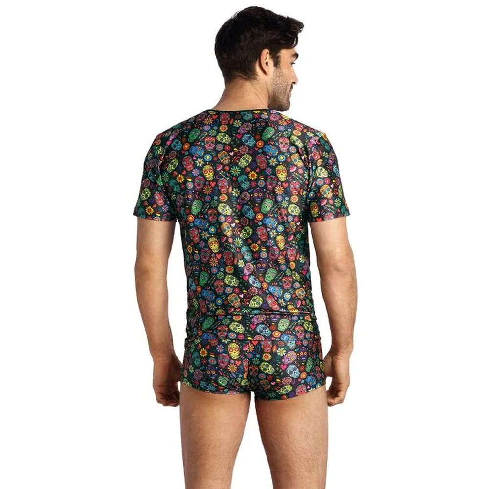 T-shirt à manches courtes imprimé calaveras mexicaines multicolores sur fond noir, motifs de crânes décorés et fleurs jaunes, roses, bleues et vertes répartis sur toute la surface