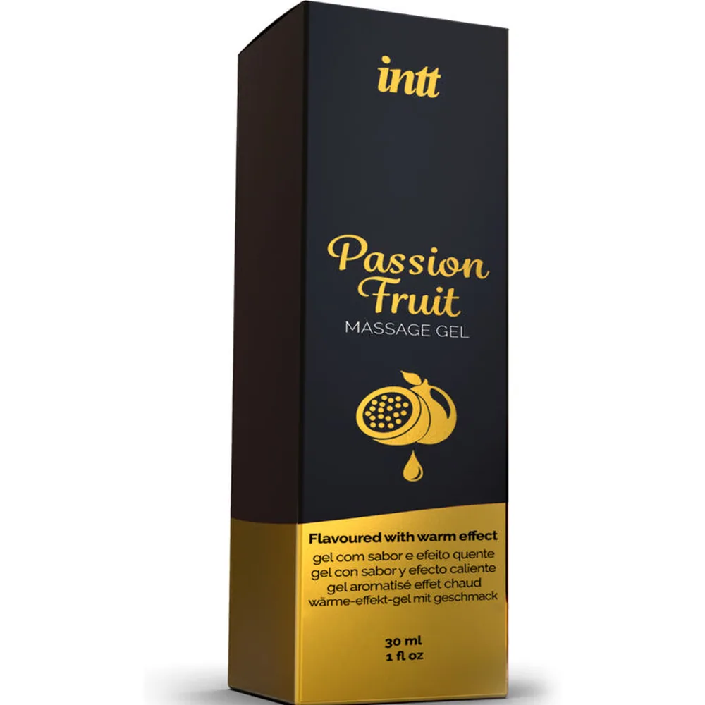 Flacon en verre de gel de massage Intt Passion Fruit, liquide ambré foncé, bouchon rose pâle, étiquette noire et or mentionnant saveur fruit de la passion et effet chauffant