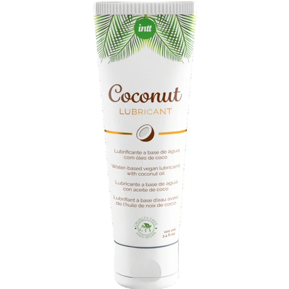 Tube blanc de lubrifiant Coconut de la marque intt, avec étiquette présentant des feuilles de palmier vertes, texte en plusieurs langues et logo vegan
