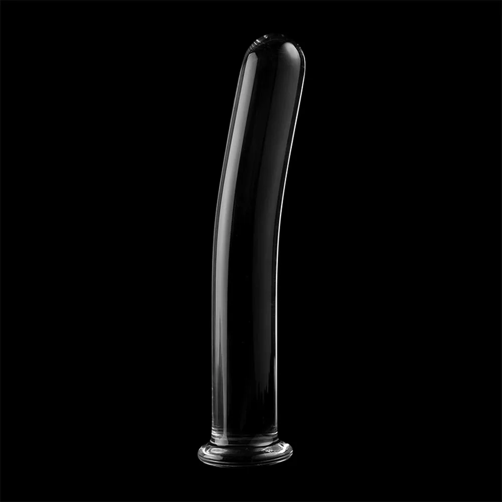 Gode en verre borosilicate transparent, forme élancée et légèrement courbée avec extrémité arrondie et base plate, fond blanc