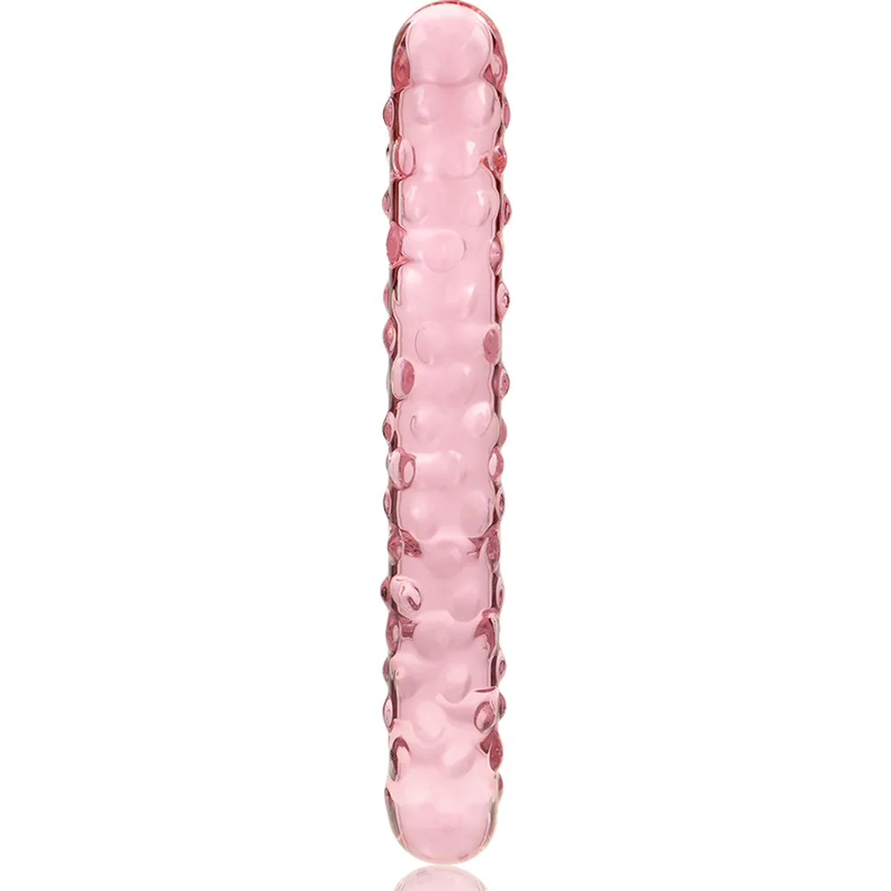 Emballage et gode en verre borosilicate rose avec picots espacés régulièrement sur toute la longueur, modèle 15