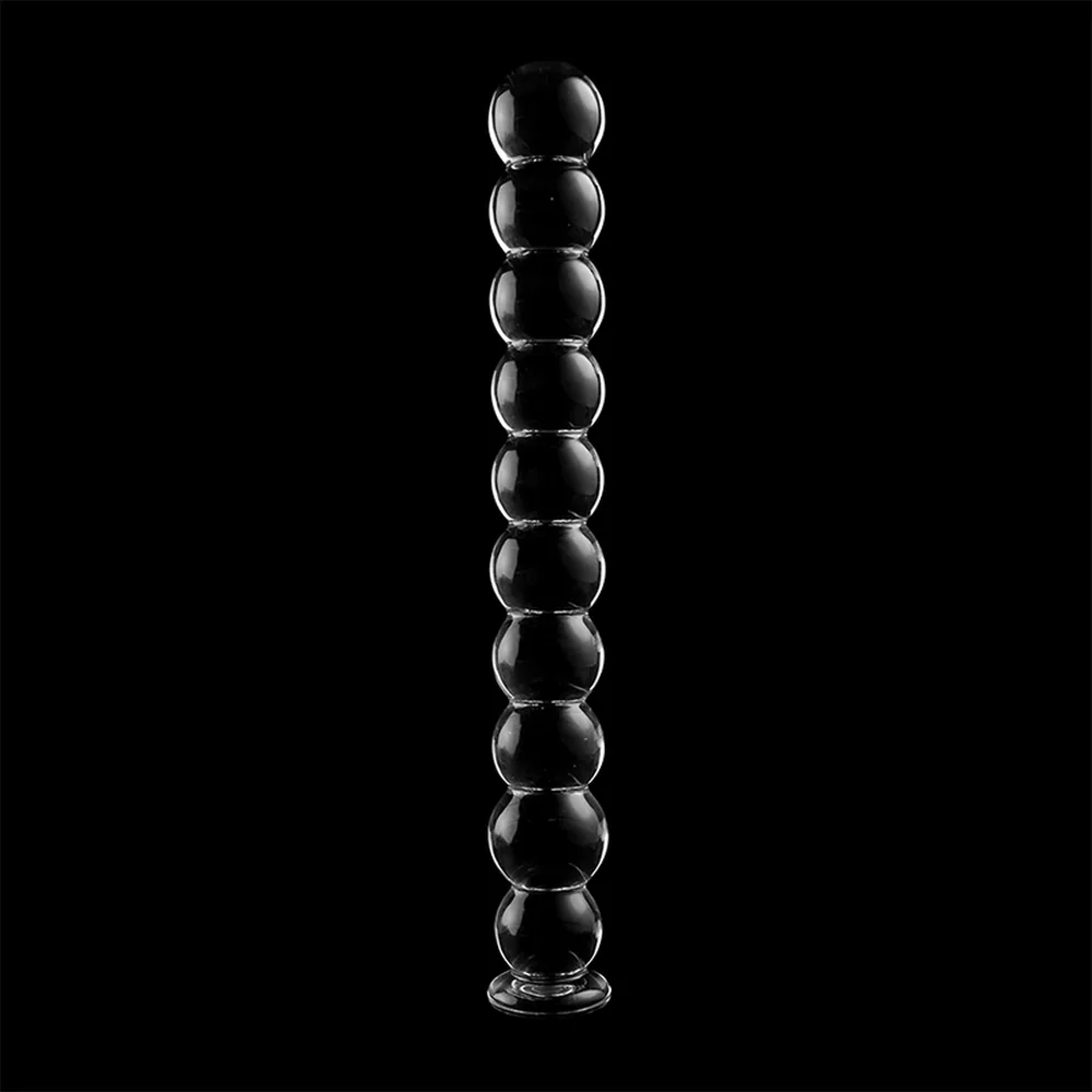 Gode en verre transparent composé de dix sphères lisses empilées verticalement, séparées par des bagues métalliques noires, sur fond blanc