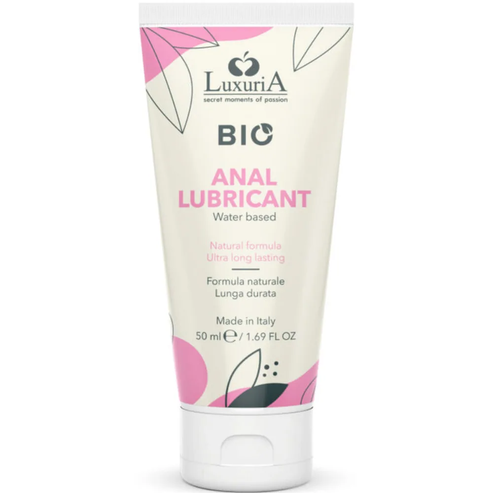 Tube blanc de lubrifiant anal Luxuria bio, base eau, 50 ml, avec étiquette rose et beige ornée de motifs géométriques et logo de la marque