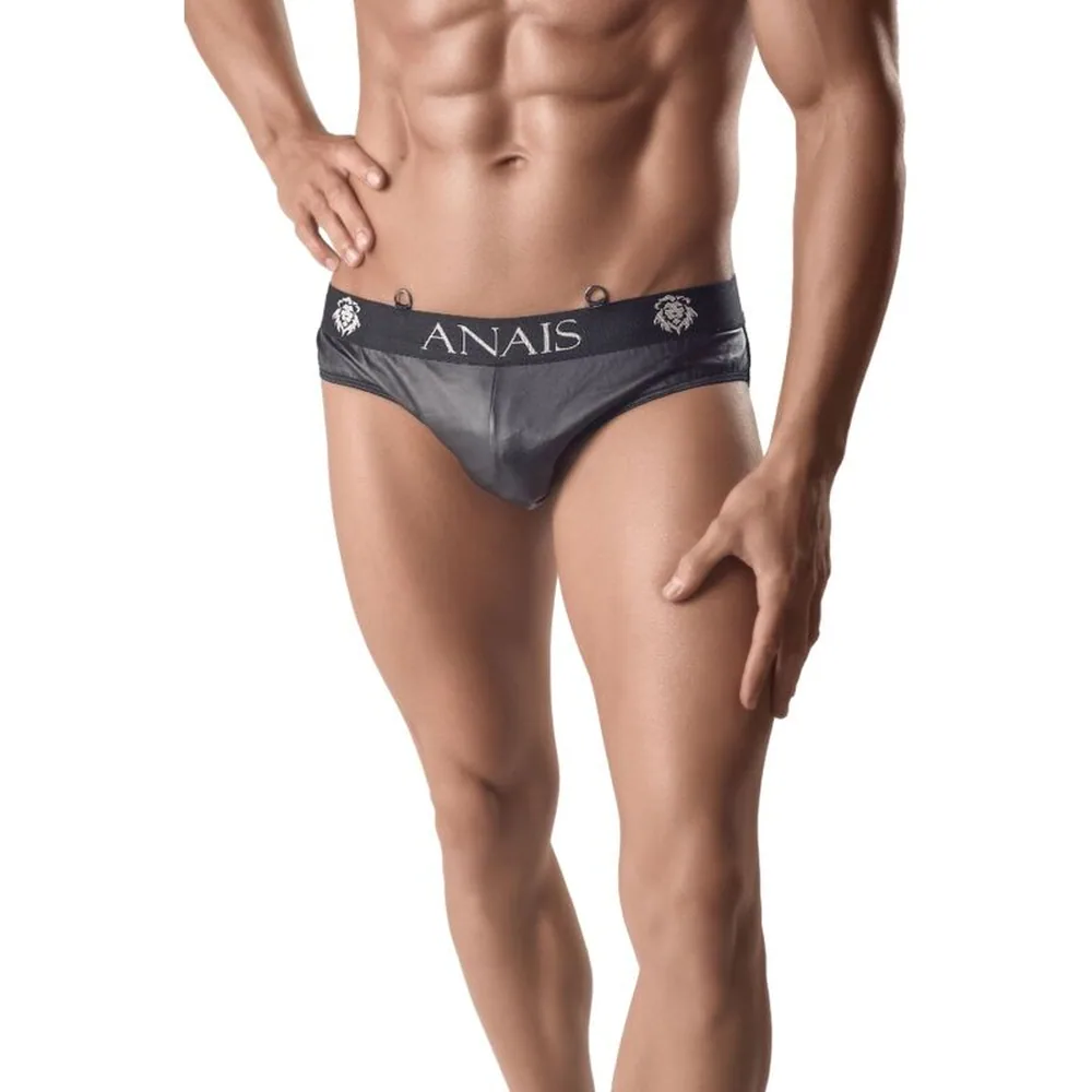 Slip noir Anaïs porté, avec devant en aspect cuir et arrière en mesh, ceinture élastique blanche à logo