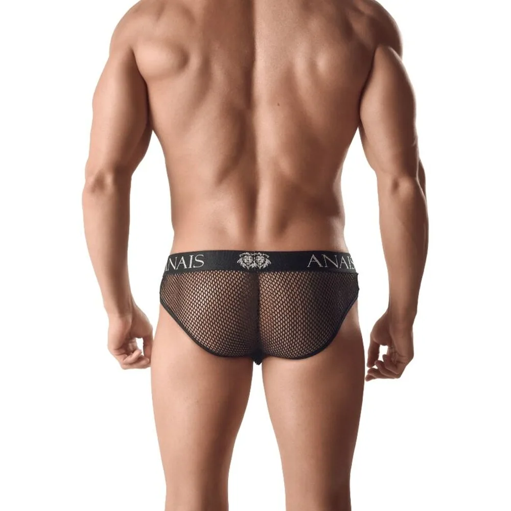 Slip noir Anaïs porté, avec devant en aspect cuir et arrière en mesh, ceinture élastique blanche à logo