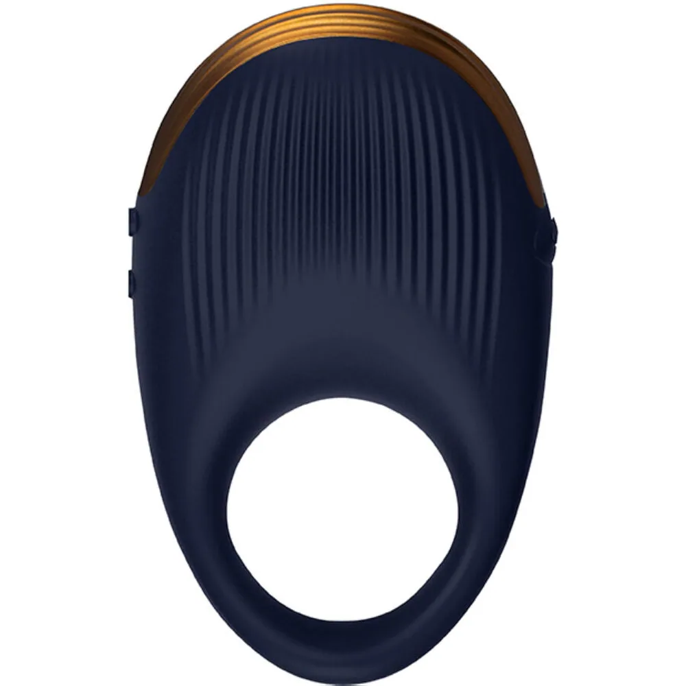 Anneau vibrateur en silicone bleu marine avec détails nervurés, bord supérieur en bois naturel clair, ouverture centrale visible sur fond blanc