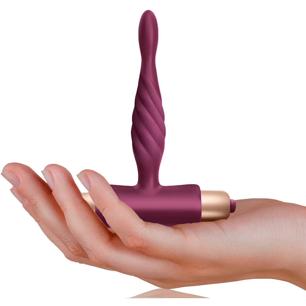 Emballage du plug anal Pharos Climaxiim, boîte bordeaux et noire avec logo doré, montrant le produit violet foncé avec embout spiralé et base dorée à l'avant