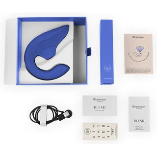 Contenu de la boîte du Womanizer Blend bleu vif, câble magnétique et notices