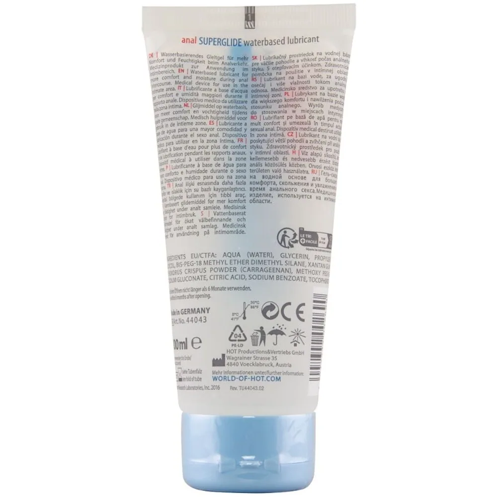 Tube blanc de lubrifiant anal Superglide à base d'eau, 100 ml, avec bouchon bleu translucide et étiquette détaillant la composition