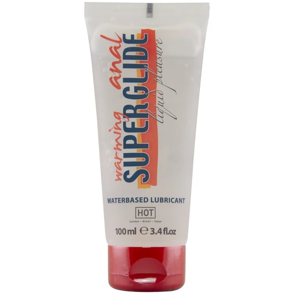 Tube de lubrifiant anal chauffant à base d'eau, avec étiquette blanche imprimée et fond de tube rouge, présentant la liste complète des ingrédients et les certifications