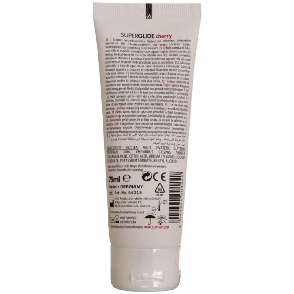Tube blanc de lubrifiant comestible Superglide saveur cerise, 75ml, avec étiquette illustrant des cerises rouges et bande rouge, de la marque HOT