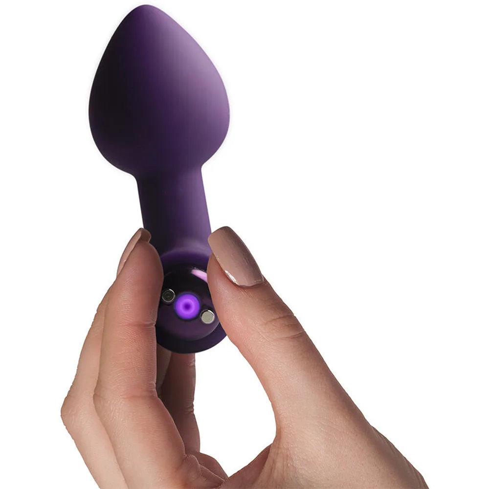 Boîte noire Nova Astryx Rocks Off avec plug anal en silicone rose pivoine, poignée transversale et câble USB de charge inclus