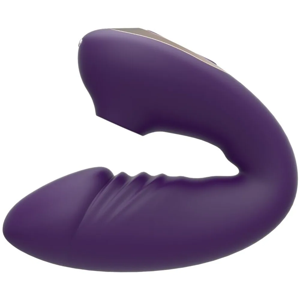 Stimulateur clitoridien en silicone violet et champagne, de forme ergonomique avec zone de contact arrondie et panneau de commande central, sur fond blanc