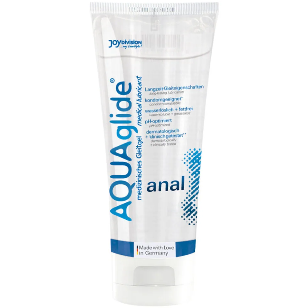 Tube blanc de lubrifiant anal Aquaglide à base d'eau, avec logo bleu de la marque Joy Division, étiquette bilingue allemand-français et mention « Made with Love in Germany »