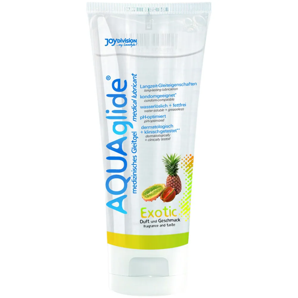 Tube blanc de lubrifiant Aquaglide Exotic avec bande jaune, motifs d'ananas et de fruits exotiques, étiquetage bleu et textes allemands et anglais sur fond blanc