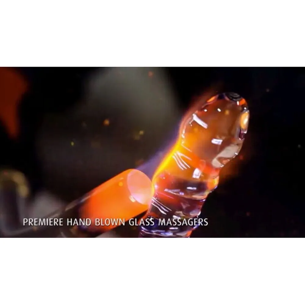 Emballage du masseur en verre Icicles n°2, montrant une colonne de sphères en verre transparent soufflé à la main, avec diamètre croissant du haut vers la base, 22 cm de longueur