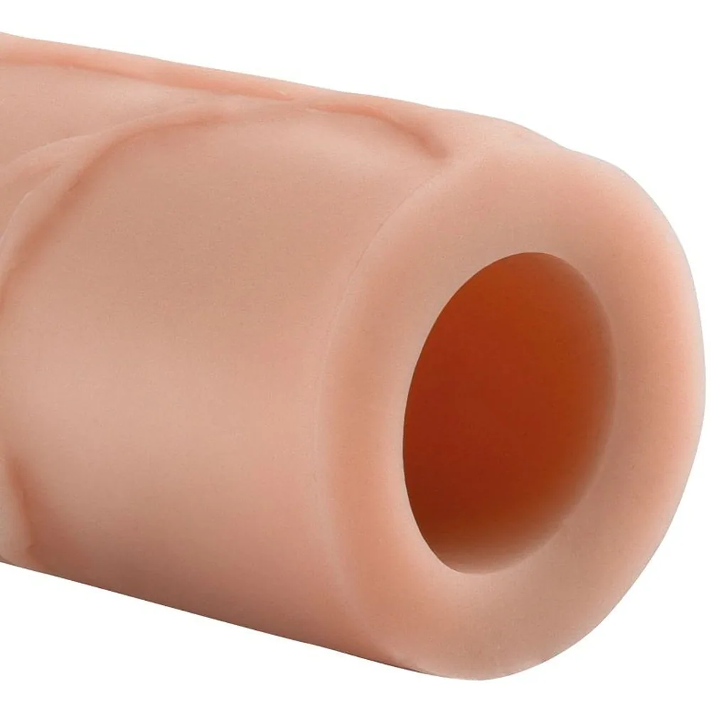 Emballage de l'extension Perfect 3 Fantasy X-Tensions, cylindre de silicone couleur chair avec nervures et gland, présenté en boîte noire et bleu